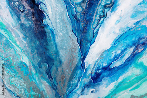 Blue and turquoise fluid acrylic pour painting abstract texture