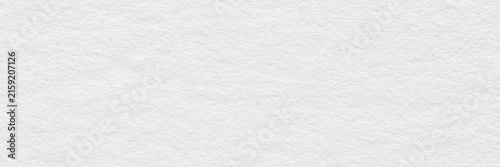 White textured paper surface with soft grain and copy space