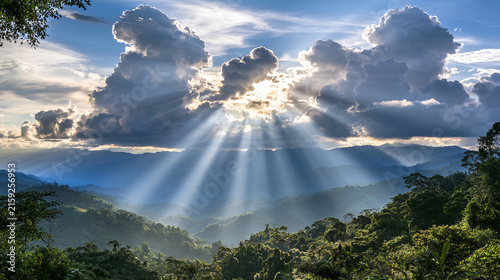 Mountain landscape in sunlight with clouds
