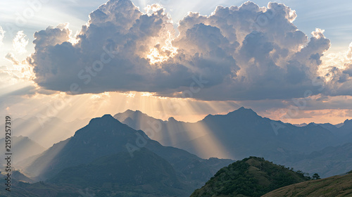 Mountain landscape in sunlight with clouds