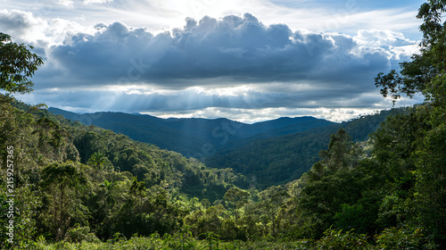Mountain landscape in sunlight with clouds