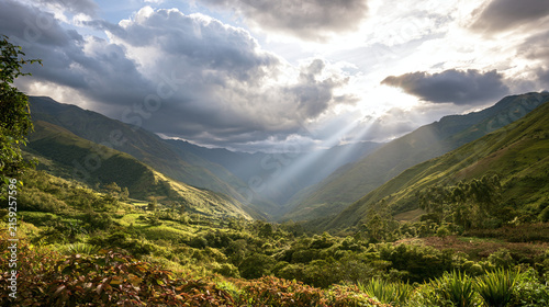 Mountain landscape in sunlight with clouds