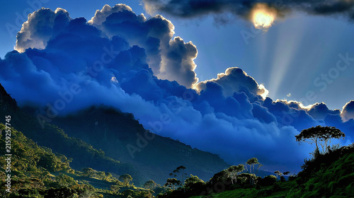 Mountain landscape in sunlight with clouds