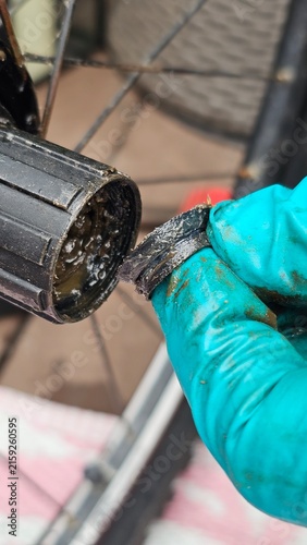 Bicycle hub repair close up, mechanical grease and troubleshooting concept