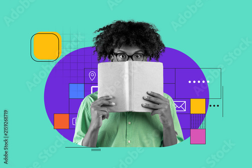 Quadro su tela Focused Young Black Male Reading Book With Intriguing Expression, Engaged In Learning And Knowledge Acquisition, In A Colorful, Modern Setting, Enjoying Intellectual Growth