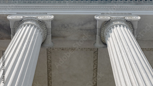 Obraz na plátne Two Treasury Building Ionic columns reveal volute capitals and portico ceiling