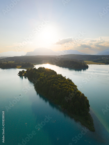 Lake Faak in Carinthia. Scenic aerial view to the island of the famous lake in Austria.