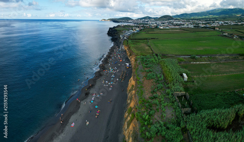 Aerial panoramic view of Praia de Santa Barbara, a long sandy surf beach on the north coast of Sao Miguel, Azores, Portugal.