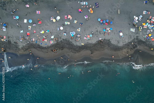 Aerial panoramic view of Praia de Santa Barbara, a long sandy surf beach on the north coast of Sao Miguel, Azores, Portugal.