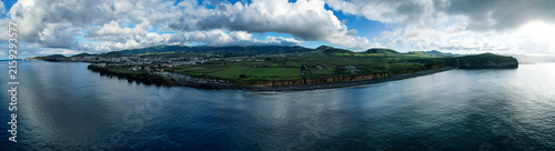 Aerial panoramic view of Praia de Santa Barbara, a long sandy surf beach on the north coast of Sao Miguel, Azores, Portugal.