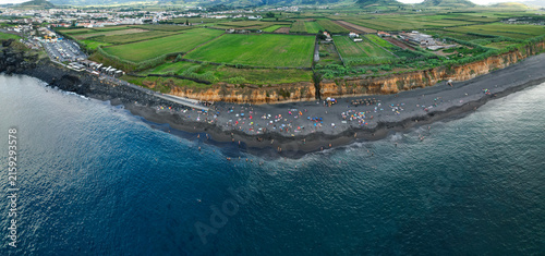 Aerial panoramic view of Praia de Santa Barbara, a long sandy surf beach on the north coast of Sao Miguel, Azores, Portugal.