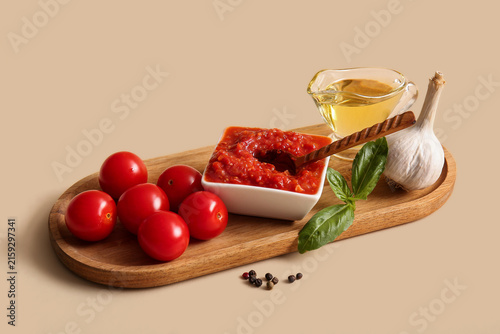 Wooden tray with bowl of ta...