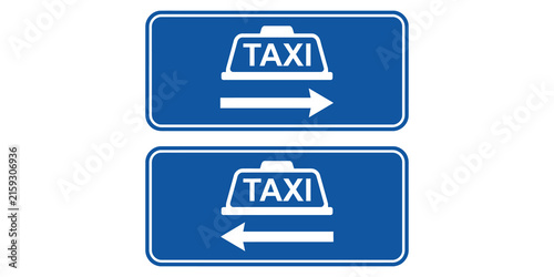 Obraz na plátně Blue taxi direction signs with arrows for urban navigation and transport infrastructure