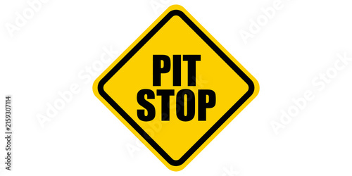 Quadro su tela Diamond shaped yellow sign with bold black text reading pit stop for motor sports race track information and maintenance zones