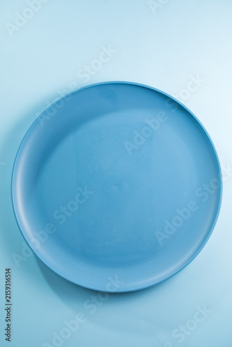 White big size, empty flat plate isolated on a white background.