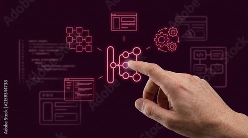 Human hand interacting with digital data management system icons including flowcharts, software code, and processing gears on a dark background.