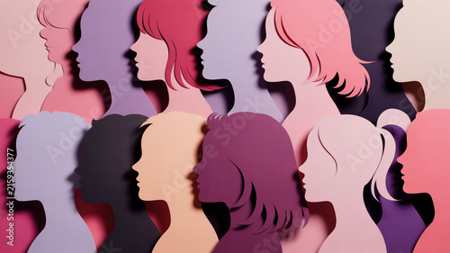 Layered Paper Cutout Silhouettes of Women's Profiles in Various Pastel and Pink Hues female