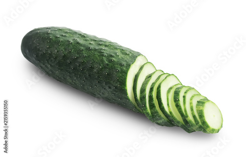 Fotografie Fresh raw green cucumber, partially sliced into pieces