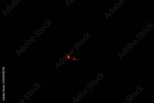 Mt. Etna volcano erupting at night in Sicily Italy