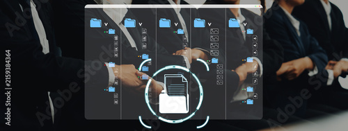 Digital File Organization Concept Showing Business Professionals Using Technology to Manage Documents and Improve Workflow Efficiency in Modern Office Environment. Sentient.