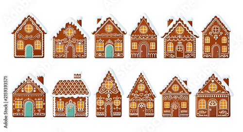 Set of decorative gingerbread houses with icing details and festive colors arranged in a row.