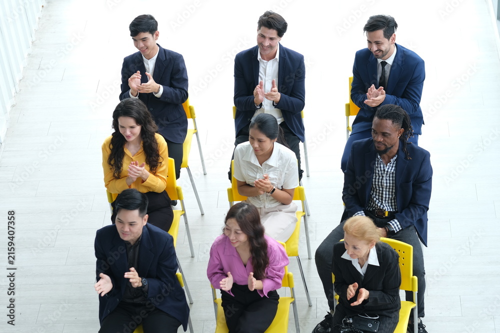 Fototapeta premium Top view successful business group of multiethnic people meeting,Communication Training, Discussing office Organization, Event Management Business. Business Team Meeting in Modern Office Workplace.