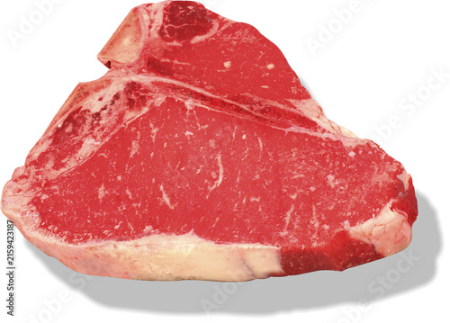 Close-up of fresh raw beef steak slices on white plate with marbled texture