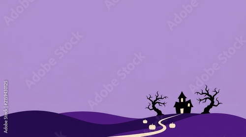 A spooky halloween landscape with a winding path leading to a silhouetted haunted house and bare trees