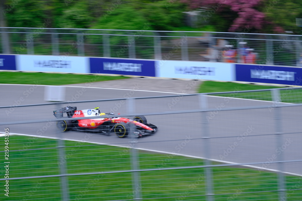 Fototapeta premium May 24, 2025, Montreal, Canada, Charles Leclerc drives Ferrari F1 car at Circuit Gilles Villeneuve. g.