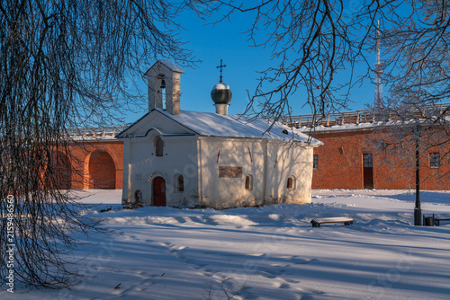 Saint Andrew Stratelates Church near the walls of the Novgorod Kremlin (Novgorodsky Detinets) on a sunny winter day, Veliky Novgorod, Russia
