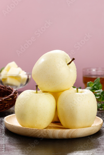 Fresh Golden Fuji Apples on Wooden Plate - Healthy Organic Fruit Food Photography