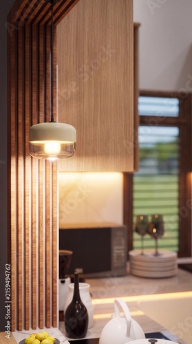 Modern kitchen interior design featuring a warm hanging pendant light and wood paneling