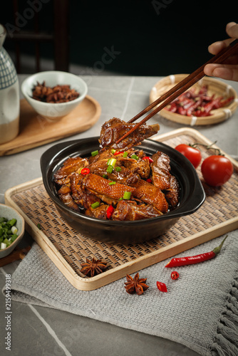 фотографія Braised Goose Hot Pot Stewed with Vegetables and Spices in Traditional Cast Iron