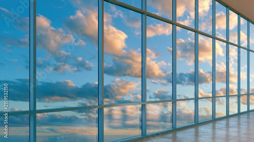 Looking sky glass window cloud reflection modern building architecture interior view of sunset cloudscape through large glass window wall modern