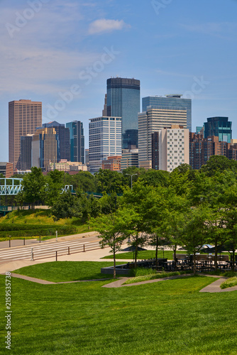 Skyline view of downdown Minneapolis as a vibrant vertical daytime shot on a summer day