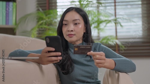 Asian woman making online payment using smartphone
