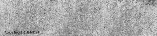 фотографія Panoramic view of a weathered grey concrete surface with rough, grainy, and pitt