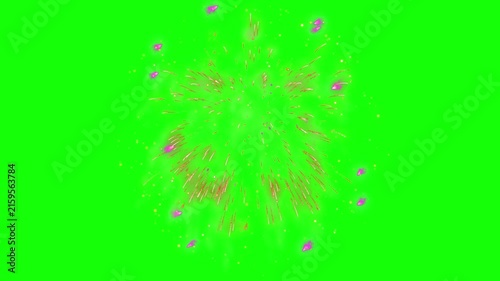 Firework explosion in vibrant yellow bursts outward against a bright green screen background for video editing.
