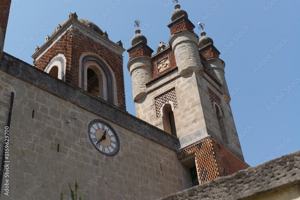Fototapeta premium Architectural details of Rocchetta Mattei Castle, featuring a historic tower and Gothic-inspired elements in Emilia-Romagna, Italy.