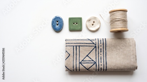 Textured Fabric with Decorative Buttons and Thread for Sewing Crafts Use