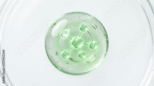 glass of water on green background