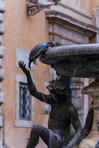 Sculptures in fountain in the historical part of Rome, capital c