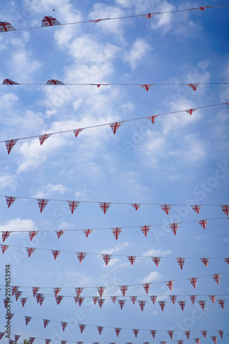 Canvas Print Georgian flag bunting hanging against a blue sky