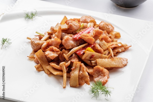Quadro su tela Stir-fried pork tenderloin with mixed mushrooms (king oyster mushrooms, seafood