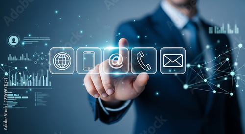 Businessman touching digital interface with contact icons and data analytics