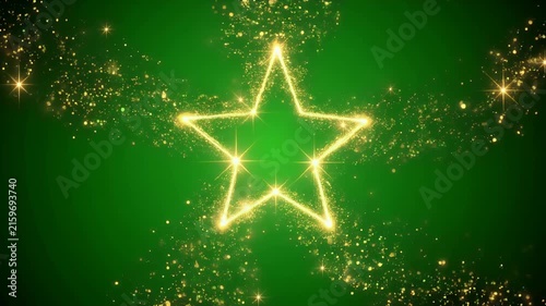 A glowing golden star formation on a dark green background.