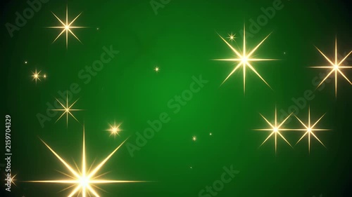 Glowing golden stars twinkle against a vibrant green background.