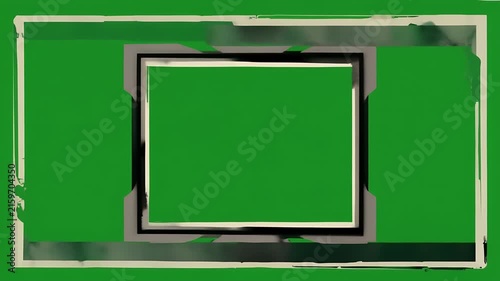 Abstract geometric composition with green background and layered frames.