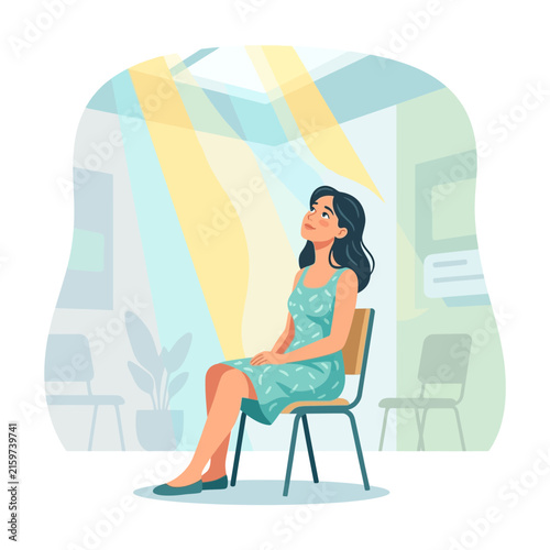 Woman basks in sunbeams from ceiling windows, finding peace and tranquility indoors.