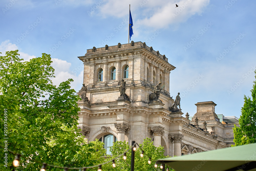 Fototapeta premium Reichstag Building with European Union Flag in Berlin